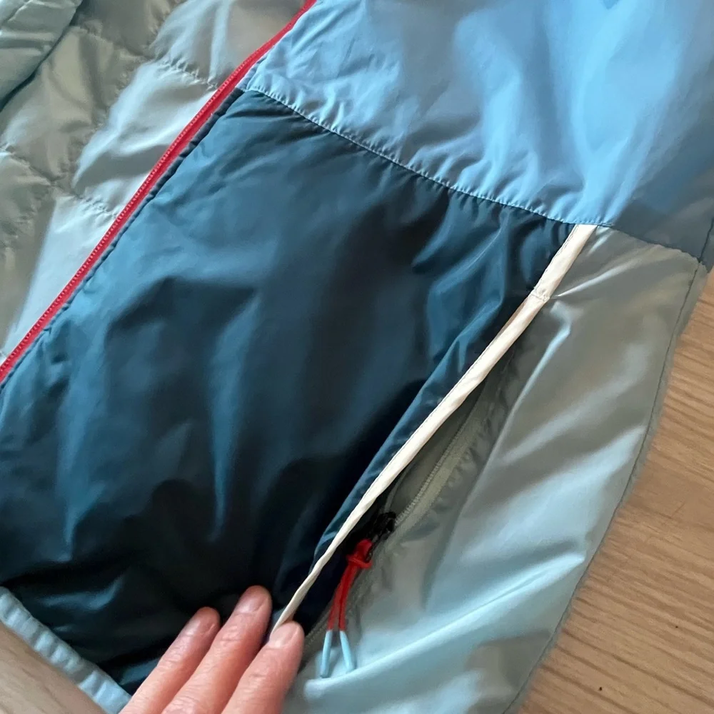 Cotopaxi Multi-blues Reversible Hooded Puffer Vest - Picture 9 of 11